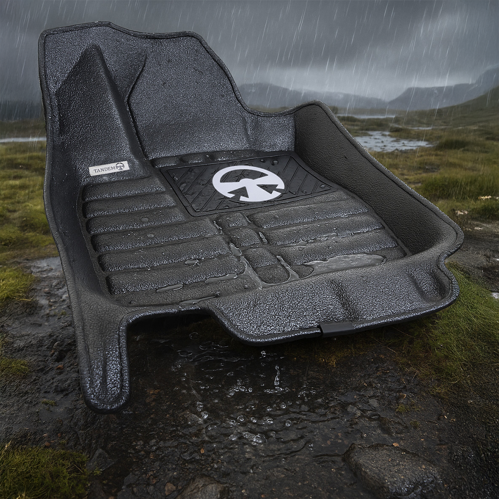 tandem car mat in heavy rain on a muddy trail